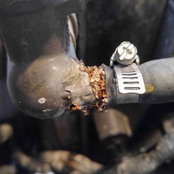 Tony's Service Center - Tony's knows plastics. this is a bad cooling system fitting on a Ford engine.
