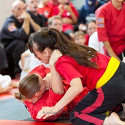 Kajukenbo Arizona - Women in our MMA program grappling during quarterly testing.