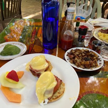 Blue Heaven - Eggs Benedict w/Ham, fruit, potatoes and avocado. - Breakfast & Brunch Near Me - Key West, Florida