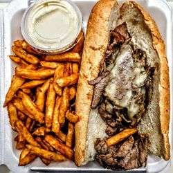 Pub of Penn Valley - Pub's Hot Roast Beef- in Au Jus with Cheddar Cheese and Horseradish Sauce on a Long Roll $17