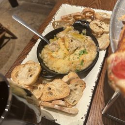 Artichoke app- personally not a fan. It tasted/looked/smelled like it was pure roasted garlic. The crostini was also extremely hard Artichoke app- personally not a fan. It tasted/looked/smelled like it was pure roasted garlic. The crostini was also extremely hard