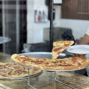 Slice of Sicily Pizza - Extra Jumbo slice of pizza, 12:00 - 3:00 pm - Salad Near Me - Pigeon Forge, Tennessee Slice of Sicily Pizza - Extra Jumbo slice of pizza, 12:00 - 3:00 pm - Salad Near Me - Pigeon Forge, Tennessee