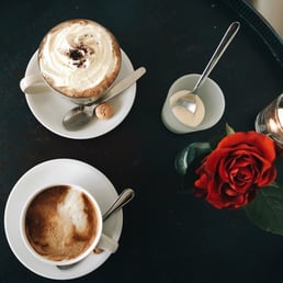 Soy latte and a chocochino with whipped cream. Soy latte and a chocochino with whipped cream.
