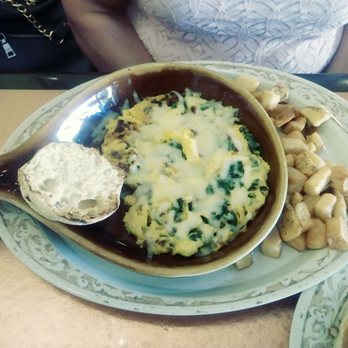 Another Broken Egg Cafe - Spinach scrambled eggs with onions and bacon. - Cafes Near Me - Memphis, Tennessee Another Broken Egg Cafe - Spinach scrambled eggs with onions and bacon. - Cafes Near Me - Memphis, Tennessee