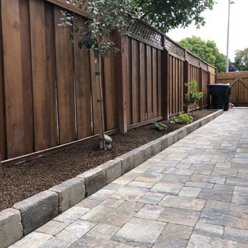 Universal Pavers And Landscaping - Right Side Yard Floor: Quarry Stone from Cal Stone. Right Side Yard Gardening Fence: Roman Stone from Cal Stone. - Masonry/Concrete Near Me Universal Pavers And Landscaping - Right Side Yard Floor: Quarry Stone from Cal Stone. Right Side Yard Gardening Fence: Roman Stone from Cal Stone. - Masonry/Concrete Near Me