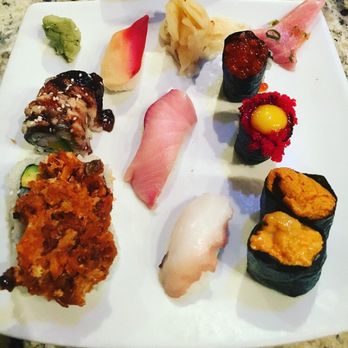 Sushi 101 - A mixture of sea urchin roe, salmon roe, fatty tuna, yellowtail tuna, surf clam, octopus, a lava roll and dancing eel roll!!!! Mmm - Sushi Bars Near Me - Charlotte, North Carolina Sushi 101 - A mixture of sea urchin roe, salmon roe, fatty tuna, yellowtail tuna, surf clam, octopus, a lava roll and dancing eel roll!!!! Mmm - Sushi Bars Near Me - Charlotte, North Carolina