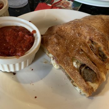 Mellow Mushroom Fleming Island - 1/2 of The Sausagefest Calzone - Pizza Near Me - Fleming Island, Florida Mellow Mushroom Fleming Island - 1/2 of The Sausagefest Calzone - Pizza Near Me - Fleming Island, Florida