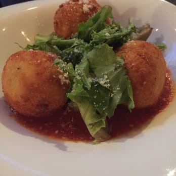 Roostica - Fried saffron risotto balls - Italian Near Me - Key West, Florida Roostica - Fried saffron risotto balls - Italian Near Me - Key West, Florida