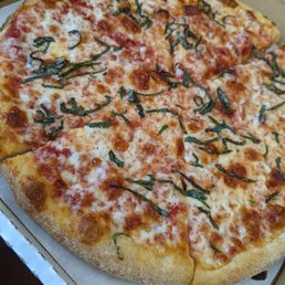 Margherita pizza from Tricolore Caffe in the Financial District of San Francisco California. Margherita pizza from Tricolore Caffe in the Financial District of San Francisco California.