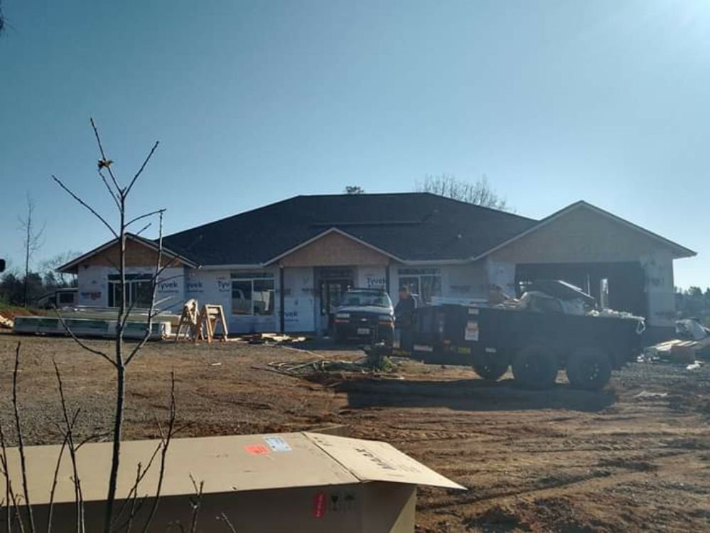 Slide of Mackney Roofing