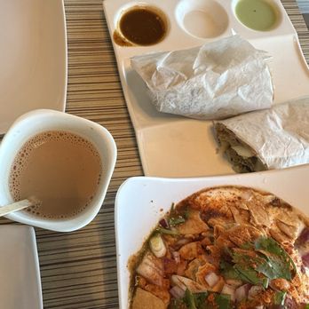 Bismillah Restaurant & Cafe - a plate of food and a cup of coffee - Burgers Near Me - Houston, Texas Bismillah Restaurant & Cafe - a plate of food and a cup of coffee - Burgers Near Me - Houston, Texas