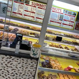 a display of a variety of donuts a display of a variety of donuts