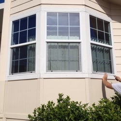 A Fresh Breeze - These are new rescreens. What a difference it makes. Now the home owner can see her view.