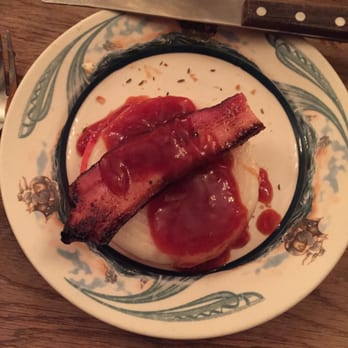 Peter Luger - Bacon app paired with tomato and onion app (with copious amounts of Peter Luger sauce). - Steakhouses Near Me - Brooklyn, New York Peter Luger - Bacon app paired with tomato and onion app (with copious amounts of Peter Luger sauce). - Steakhouses Near Me - Brooklyn, New York