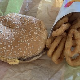a burger and onion rings a burger and onion rings