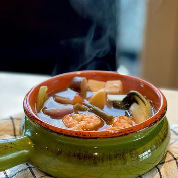 Kuya’s Cooking - a bowl of soup on a table - Filipino Near Me Kuya’s Cooking - a bowl of soup on a table - Filipino Near Me