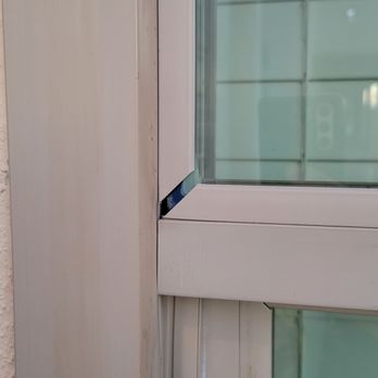 Rogers Window - a closeup of a broken window - General Contractors Near Me - Bellflower, California