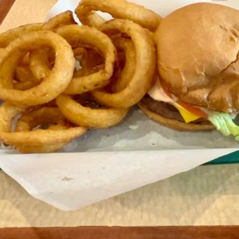 The Burger Place - a basket of onion rings and a burger - Burgers Near Me - Minneapolis, Minnesota The Burger Place - a basket of onion rings and a burger - Burgers Near Me - Minneapolis, Minnesota