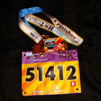Frozen Hot Chocolate Run - Medal and race bib! I love love love the medal! - Festivals Near Me - Del Valle, Texas