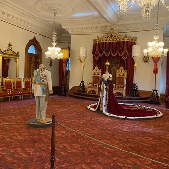 Iolani Palace - King Kalakaua and Queen Kapiolani's coronation attire in the red room - Museums Near Me - Honolulu, Hawaii Iolani Palace - King Kalakaua and Queen Kapiolani's coronation attire in the red room - Museums Near Me - Honolulu, Hawaii