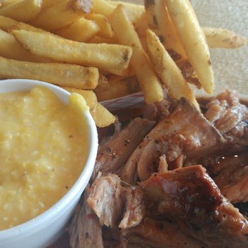 Saw's Soul Kitchen - Fries, cheese grits and pulled pork. Big chunks of meat and plenty of bark. - Barbeque Near Me - Birmingham, Alabama