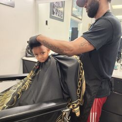 Redus Barber Shop - Farrar was patient while providing my youngest with a haircut.