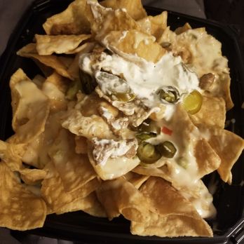 Del Taco - It's supposed to be a large carne asada nacho with extra queso and extra carne asada. - Mexican Near Me - Moore, Oklahoma Del Taco - It's supposed to be a large carne asada nacho with extra queso and extra carne asada. - Mexican Near Me - Moore, Oklahoma