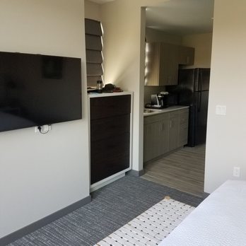 The Independence Hotel - Room 422 Eola-Amity Suite: Full Size Fridge and Wall Mounted Flat Screen TV - Hotels Near Me - Independence, Oregon