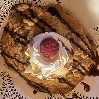 Madam’s Lounge & Theatre - Chocolate Chip Cookie topped with Vanilla Ice Cream and a Raspberry. very tasty but the cookie was very hard. - New American Near Me - Red River, New Mexico Madam’s Lounge & Theatre - Chocolate Chip Cookie topped with Vanilla Ice Cream and a Raspberry. very tasty but the cookie was very hard. - New American Near Me - Red River, New Mexico