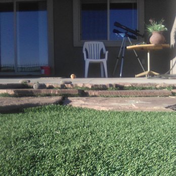 Extreme Landscaping - Look at the bumps and creases in this artificial turf not a flat lawn - Landscaping Near Me