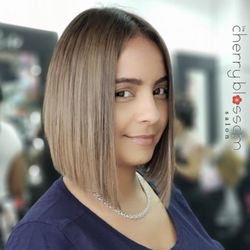 The Cherry Blossom Salon - Marie-Dee specializes in bobs, short haircuts, and color that compliment your face shape and complexion.