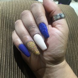 Matte nude and blue with 3D blue and gold nails.. Matte nude and blue with 3D blue and gold nails..