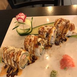 a plate of sushi on a table