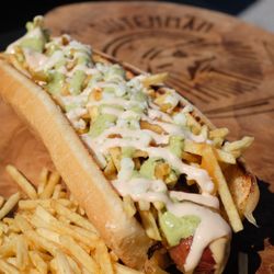 The Hungry Dutchman - Colombian ¼ Pound Hotdog - Garlic Cilantro Aioli, Pink Sauce, Pineapple Chutney, Cotija Cheese, 
Crunchy Potato Stix