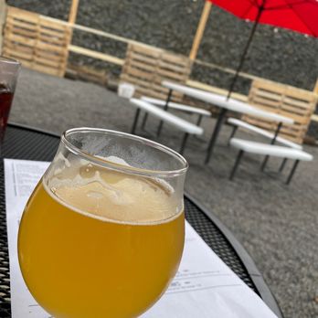 breaker brewing outpost - a glass of beer on a table - Brewpubs Near Me - Archbald, Pennsylvania