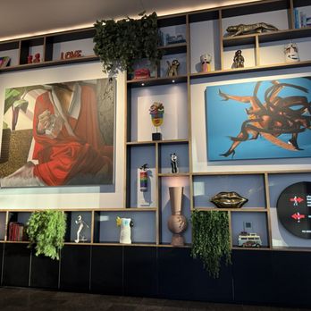 citizenM Austin Downtown - Art wall by the bar - Hotels Near Me - Austin, Texas citizenM Austin Downtown - Art wall by the bar - Hotels Near Me - Austin, Texas