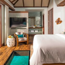 Kensington Traveler Services - Tahiti- Over the Water Bungalow