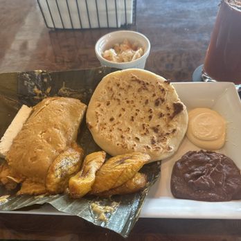 El Buen Paladar - The Sampler 1 Tamal, 1 pupusa, fried platain, beans, creme and cheese - Food Trucks Near Me - San Antonio, Texas