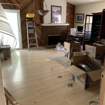 RA Construction - Front room with fireplace - General Contractors Near Me