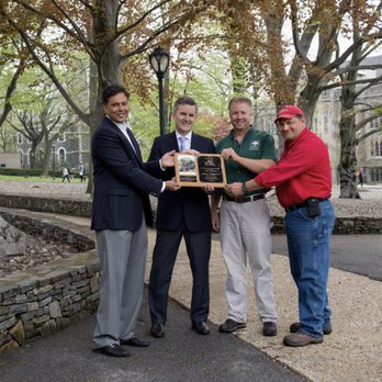 Emerald Tree & Shrub Care Company - Proudly receiving a Gold Star Award from the TCIA for preservation of American Elms at Fordham University. - Tree Services Near Me - New Rochelle, New York Emerald Tree & Shrub Care Company - Proudly receiving a Gold Star Award from the TCIA for preservation of American Elms at Fordham University. - Tree Services Near Me - New Rochelle, New York