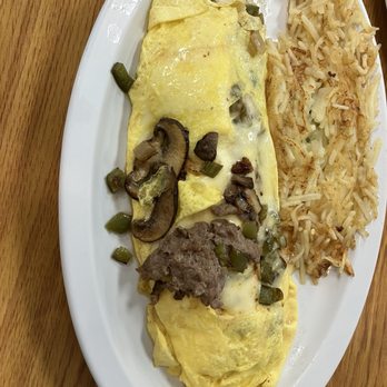 Herby's Kitchen - Philly Cheesesteak Omelet with hash browns - American Near Me - Lakeland, Florida
