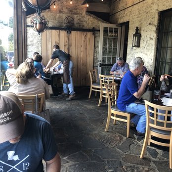 Acre - The porch (where we sat). Tons of natural light. - Bars Near Me - Auburn, Alabama Acre - The porch (where we sat). Tons of natural light. - Bars Near Me - Auburn, Alabama