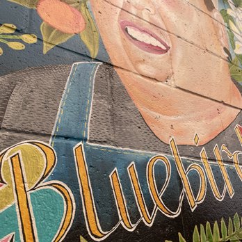 Ria's Bluebird - Their beautifully colorful mural. Our table was right under it, - Southern Near Me - Atlanta, Georgia Ria's Bluebird - Their beautifully colorful mural. Our table was right under it, - Southern Near Me - Atlanta, Georgia