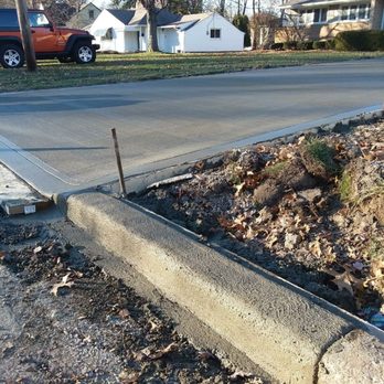 Jdk Construction - Driveway with new curbs installed in Fairview Park Ohio. - Masonry/Concrete Near Me - Lakewood, Ohio Jdk Construction - Driveway with new curbs installed in Fairview Park Ohio. - Masonry/Concrete Near Me - Lakewood, Ohio