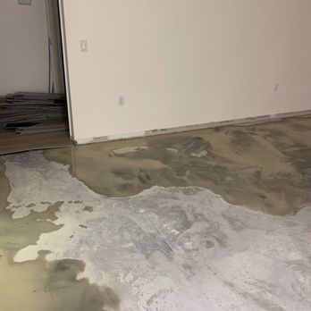 HLD Tileworks - Leveling material put down at approximately 5 PM on December 14, 2023 - Flooring Near Me - Palm Bay, Florida HLD Tileworks - Leveling material put down at approximately 5 PM on December 14, 2023 - Flooring Near Me - Palm Bay, Florida