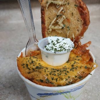 Di Folco's Roaming Occasions - a bowl of food - Food Trucks Near Me