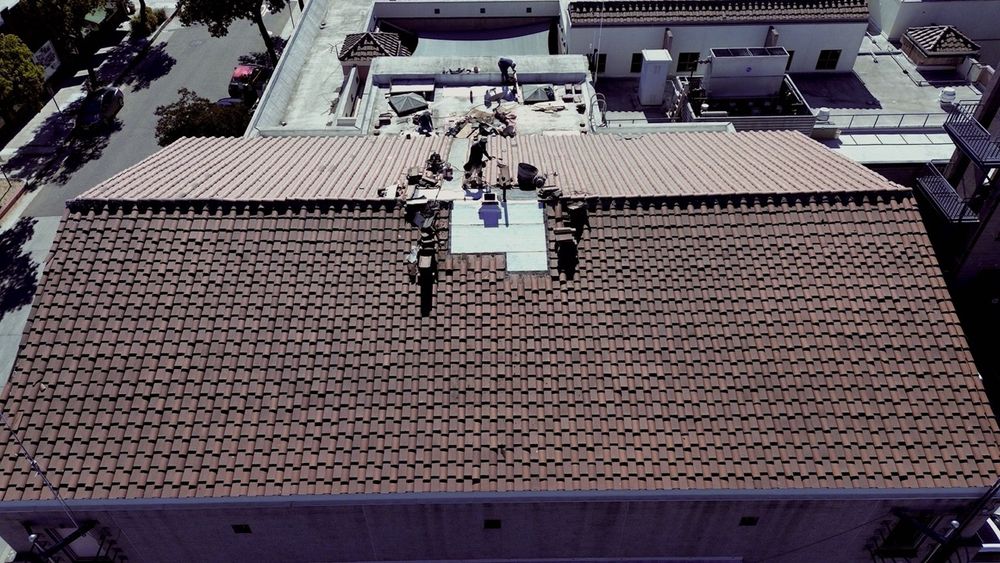 Slide of Hexagon Commercial Roofing