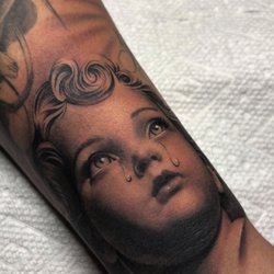 Quiet Storm Tattoo and Piercings