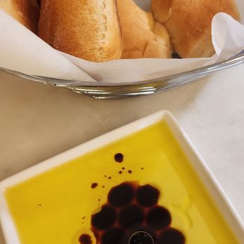 Milan - Complementary bread and dip. It was so good! Best enjoyed upon receipt! - Italian Near Me - San Jose, California