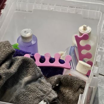 American Nails - Toe separators & dirty towel she just used on a previous client.  I literally watched her and called her out on it. I told the owner. - Nail Salons Near Me - Thornton, Colorado